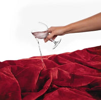 Wine spill test on the WildNightX Waterproof Blanket - liquid beads up 9