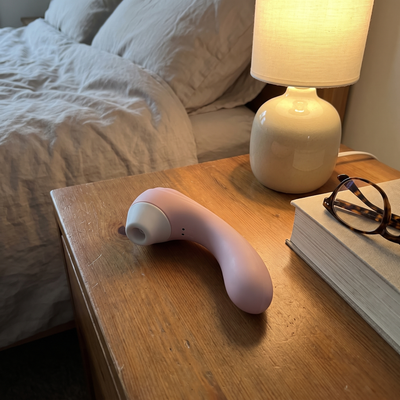 WildNightX Bloom on the nightstand beside a lamp